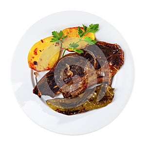 Popular dish of grilled beef Churrasco, potatoes and peppers