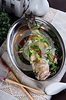 Steamed lapu lapu with sweet soy sauce and sesame oil photo
