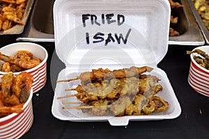 Popular Filipino street food chicken intestines Fried Isaw