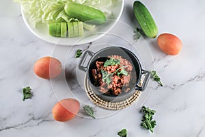 Popular Home Cooking Northern Thai meat and tomato spicy dip sauce, usually eat with fresh vegetables such as cucumber and chinese