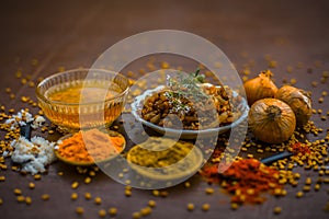 Popular Indian and Asian Methi nu shak made up of fenu greek seeds and onion with spices like coriander powder and  red chili powd photo