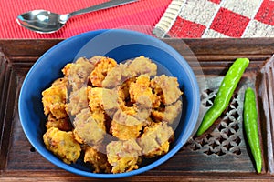 Popular Indian dish Pakora with green chili