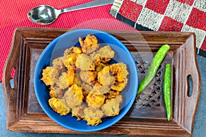 Popular Indian dish Pakora with green chili