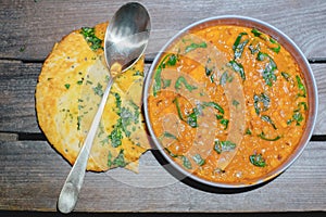 Popular Indian food vegetarian and vegan lentil dahl tadka curry soup photo