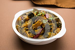 Popular indian main course vegetable Pumpkin dry curry or kaddooor kaddu ki sabzi in hindi, lal bhopla chi bhaji in marathi, selec