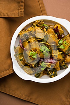 Popular indian main course vegetable Pumpkin dry curry or kaddooor kaddu ki sabzi in hindi, lal bhopla chi bhaji in marathi, selec
