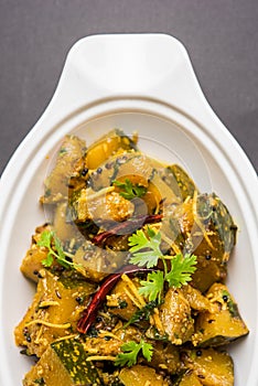 Popular indian main course vegetable Pumpkin dry curry or kaddooor kaddu ki sabzi in hindi, lal bhopla chi bhaji in marathi, selec