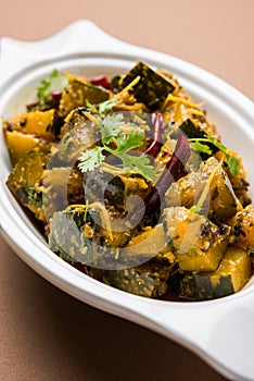 Popular indian main course vegetable Pumpkin dry curry or kaddooor kaddu ki sabzi in hindi, lal bhopla chi bhaji in marathi, selec