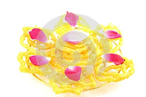 Popular Indian sweet jalebi dish on white background