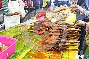 Popular Malaysia cuisine called ayam percik sold at market stall