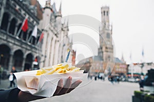 Popular street junk food in Bruges, Belgium is French Fries with