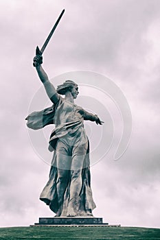 Popular touristic landmark Monument Motherland. Mamayev Hill, located in Volgograd, Russia. Dramatic filter