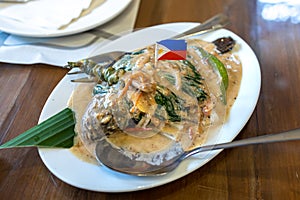 Popular Traditional Filipino fish dish Sinanglay na Tilapia
