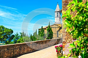 Rustic terrace with promenade and old church, Pienza, Tuscany, Italy