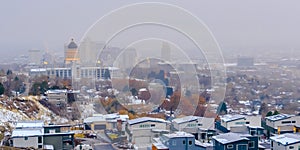 The populous Salt Lake City downtown with a hazy sky background in winter
