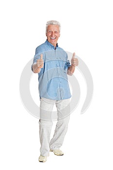 Porait of senior man showing thumbs up photo