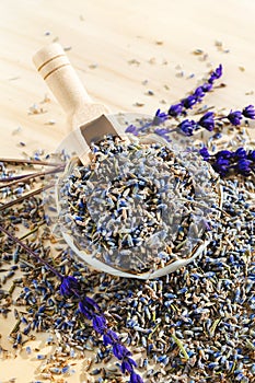 Porcelain bowl with dried lavender. Flower herbal tea drink. Aromatherapy, medicine ingredient. Calming beverage