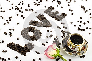 Porcelain coffee cup with rose flower and coffee beans love