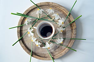 Porcelain coffee cup with white daffodils decoration