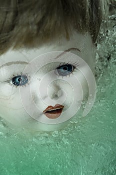 Porcelain Doll Head in Blue Green Liquid