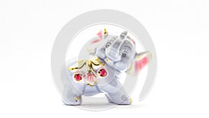 Porcelain gray smiling little elephant isolated on a white background