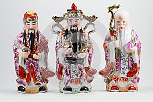 Porcelain of Hock Lok Siew or Fu Lu Shou, three gods of Chinese, isolated on white background