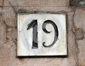 Porcelain house number nineteen