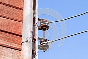 Porcelain insulator in nature day light and this is post type insulators.