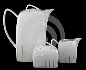 Porcelain jugs and sugar bowl