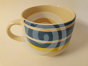 Porcelain mug of the day-to-day painted in blue and Neil