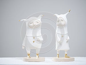 Porcelain paper mache clay statuette jesters