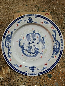 Porcelain plate with dragon image