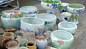 Porcelain pots in rows photo