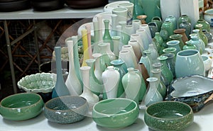 Porcelain pots in rows photo