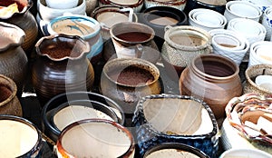 Porcelain pots in rows photo