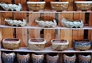 Porcelain pots in rows photo