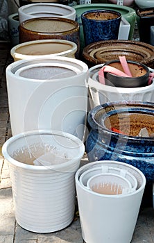 Porcelain pots in rows photo