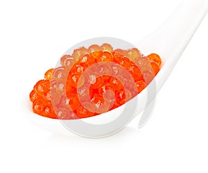 Porcelain spoon with red caviar isolated white.