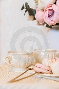 Porcelain Tea Party Set. Still life. Background. French Dessert Makaroon