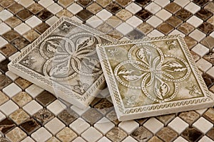 Porcelain tile and travertine mosaic photo