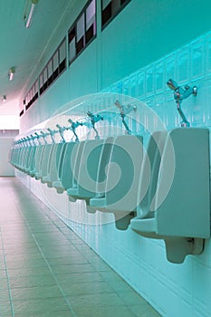 Porcelain urinals in public toilets
