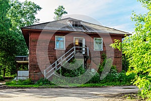 Porch of the old wooden decaying mansion