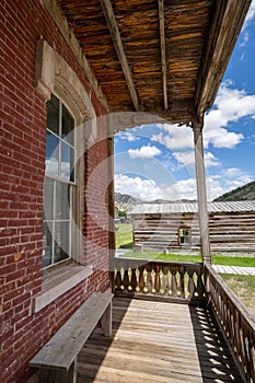 Porch view from the abandoned Hotel Meade in Bannack ghost town in Montana photo