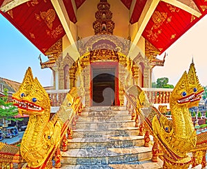 The porch of viharn-library with Naga statues, Wat Buppharam, Chiang Mai, Thailand