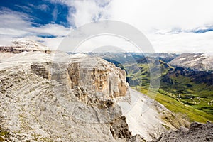 Pordoi pass mountain road valley and Piz Boe from the Sass Pordoi plateau in Dolomites, Italy, Europe