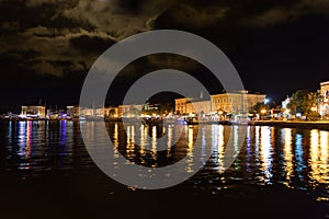 Porec city boat port at night. Croatia