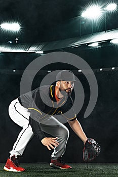 Porfessional baseball player on grand arena. Ballplayer on stadium in action.