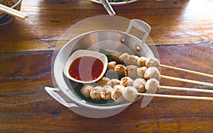 Pork ball grilled with sauce.