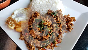 pork with basil and rice serve with fried egg