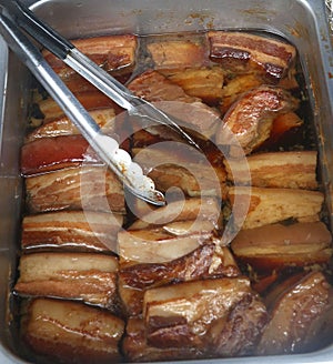 Pork Bellies in a stainless steel tin